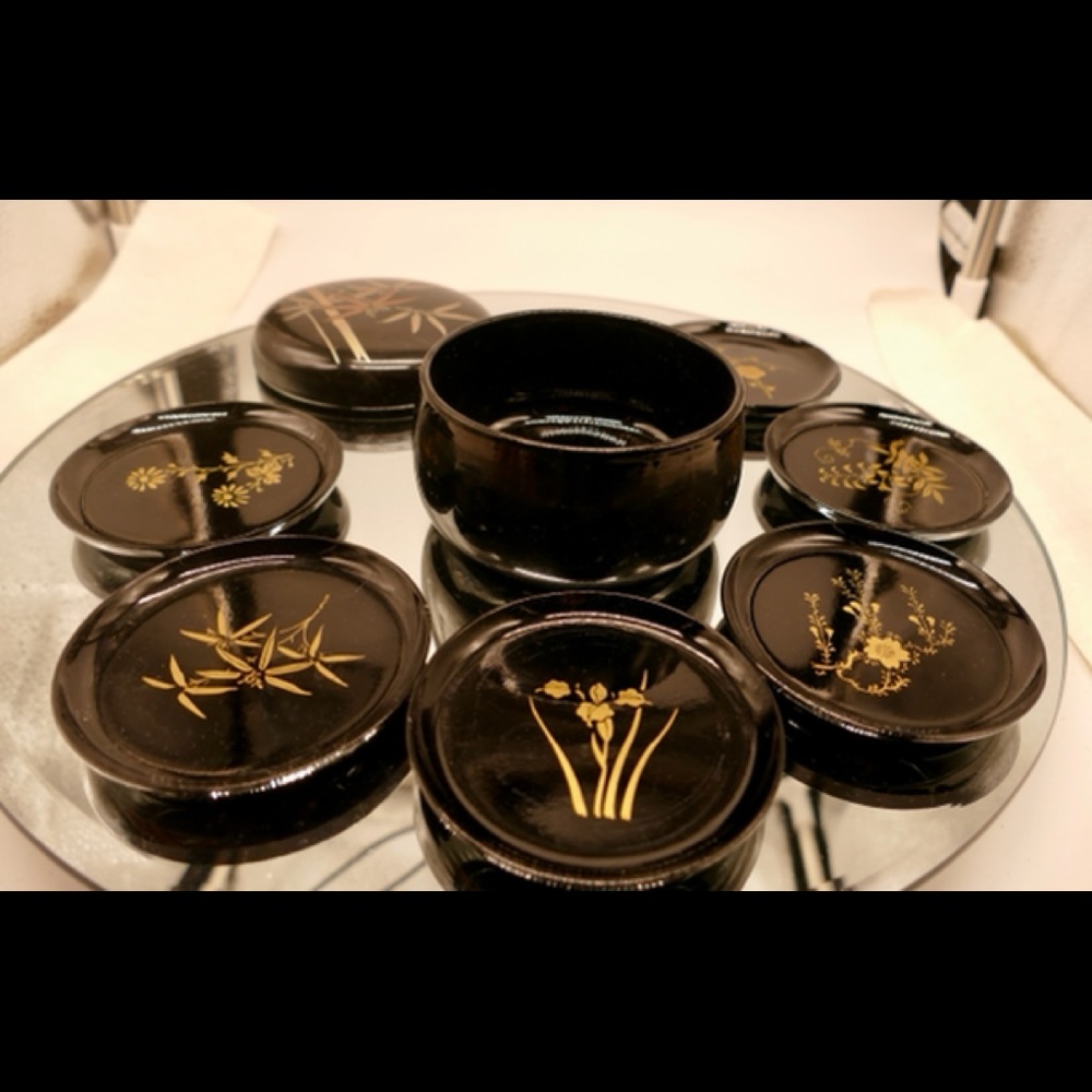 Vintage Japanese 8 piece coaster, lacquered, black and gold luster